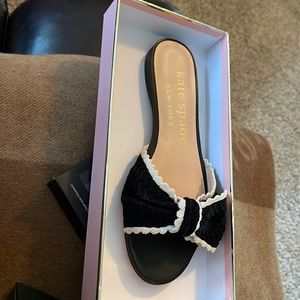 Women’s 7 1/2 Kate Spade flats. Black and white in color.